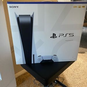 NEW PS5 WITH EXTRA CONTROLLER